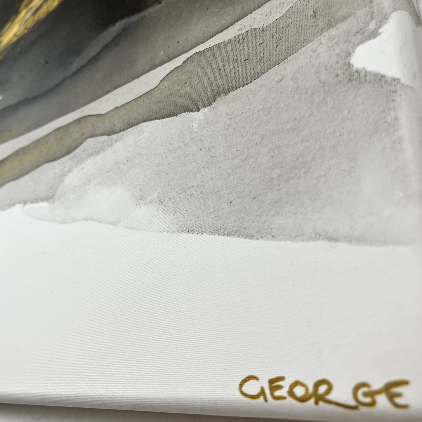 Abstract painting in black, gray, and gold tones by Charlotte George, Earth’s Whisper III, evoking molten movement and the deep pulse of the earth