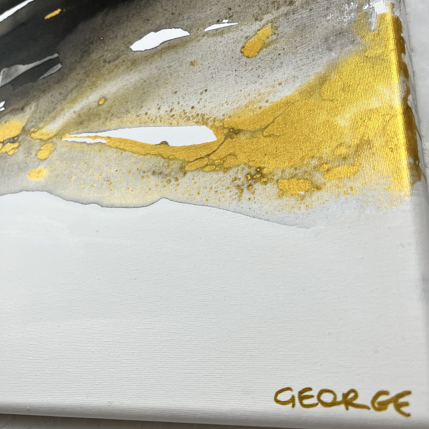 Abstract painting in black, white, and gold tones inspired by the movement and hidden elements of the earth, Earth’s Whisper II by Charlotte George.