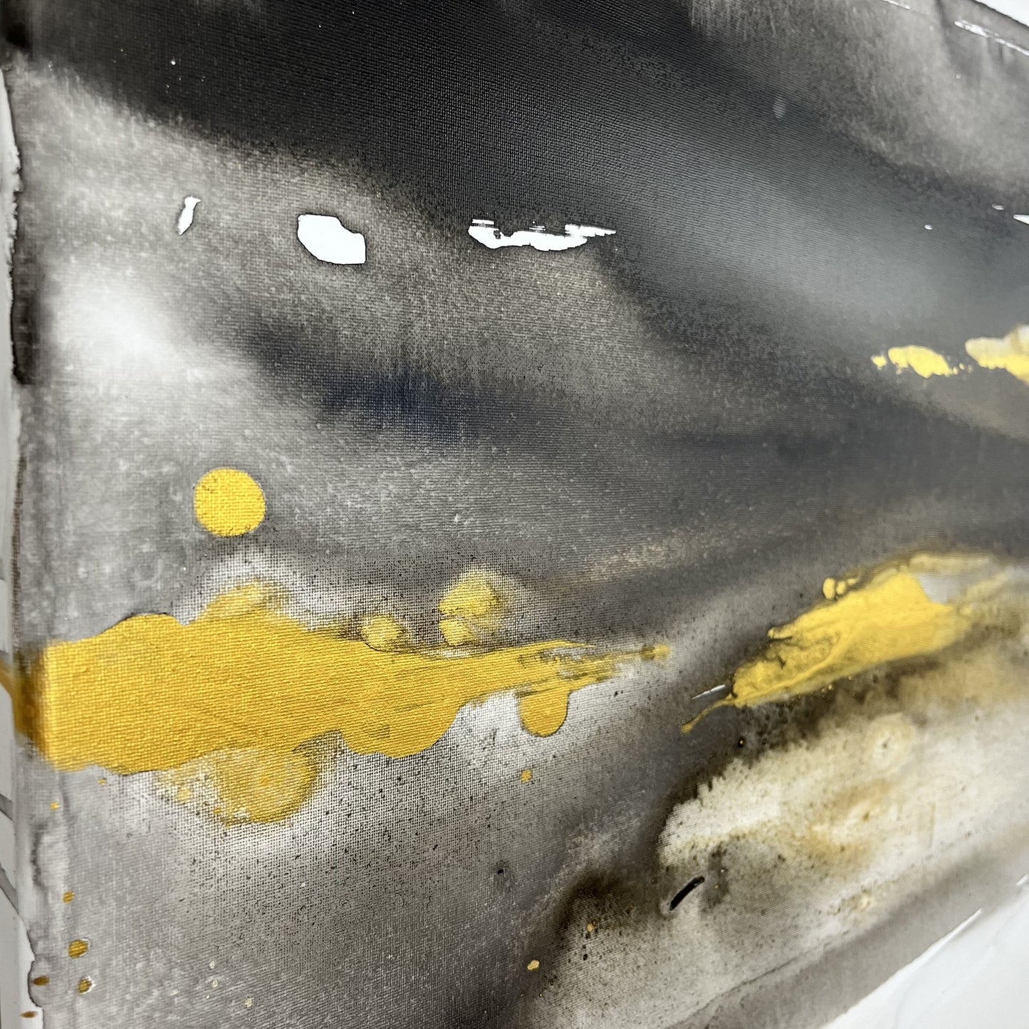 Abstract black, white, and gold painting depicting the earth’s movement and buried elements, Earth’s Whisper I by Charlotte George.