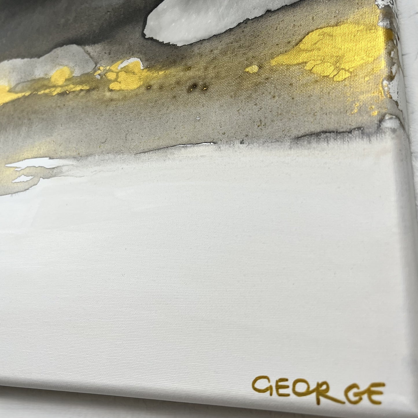 Abstract black, white, and gold painting depicting the earth’s movement and buried elements, Earth’s Whisper I by Charlotte George.