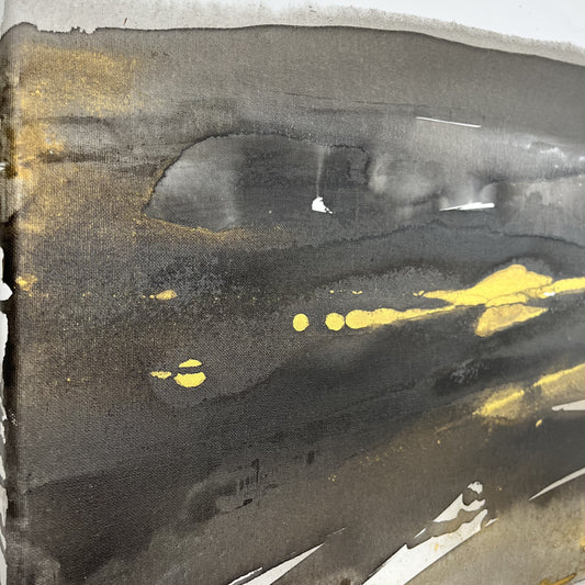 Abstract painting in black, gray, and gold tones by Charlotte George, Earth’s Whisper III, evoking molten movement and the deep pulse of the earth