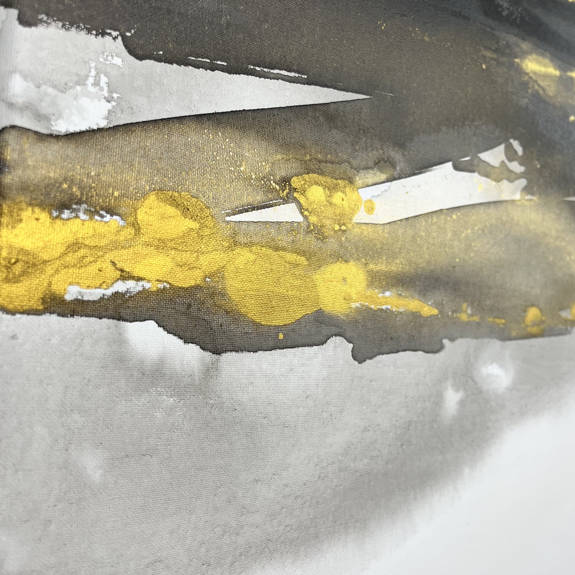 Abstract painting in black, gray, and gold tones by Charlotte George, Earth’s Whisper III, evoking molten movement and the deep pulse of the earth