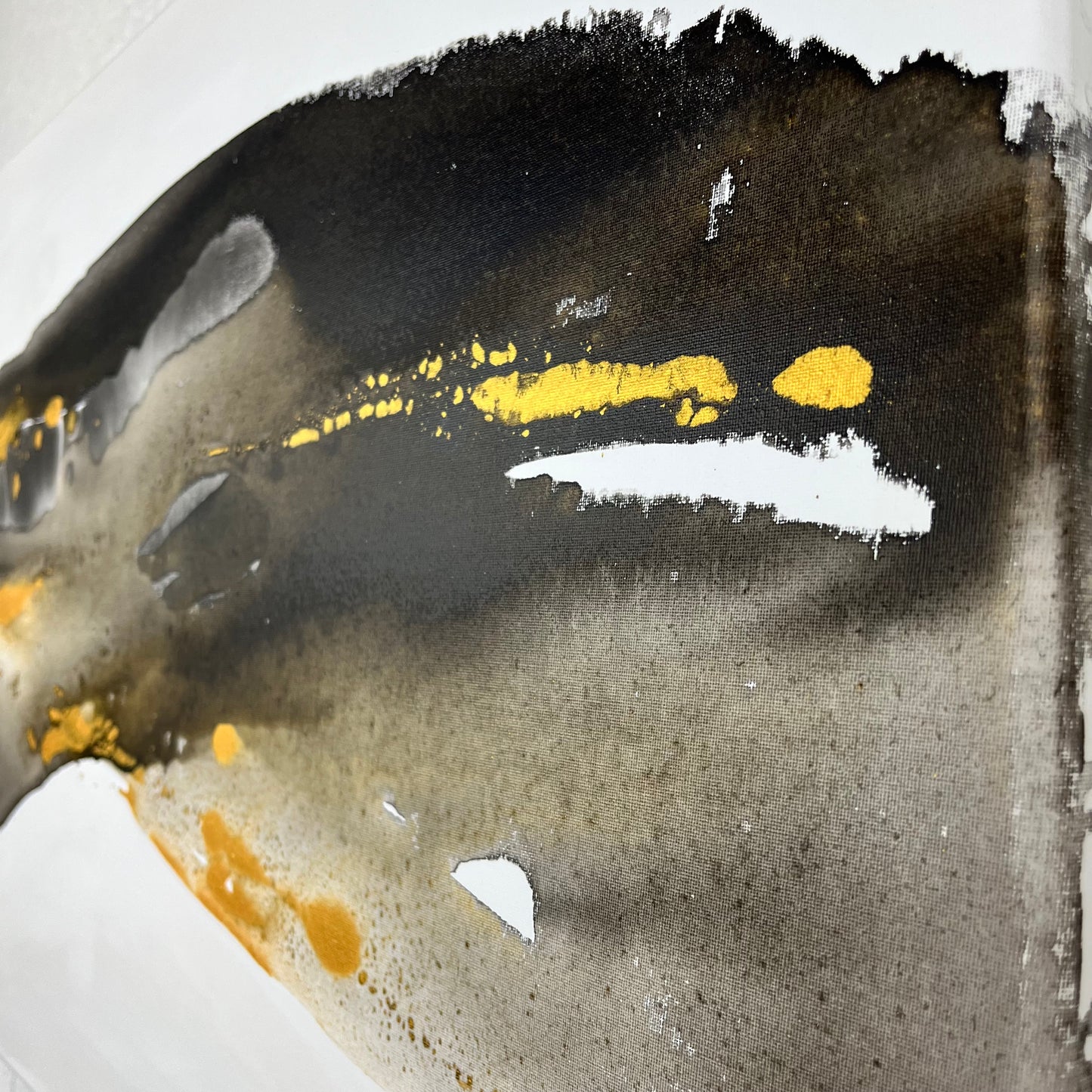 Abstract painting in black, gray, and gold tones by Charlotte George, Earth’s Whisper IV, expressing the molten energy and stillness of the earth.