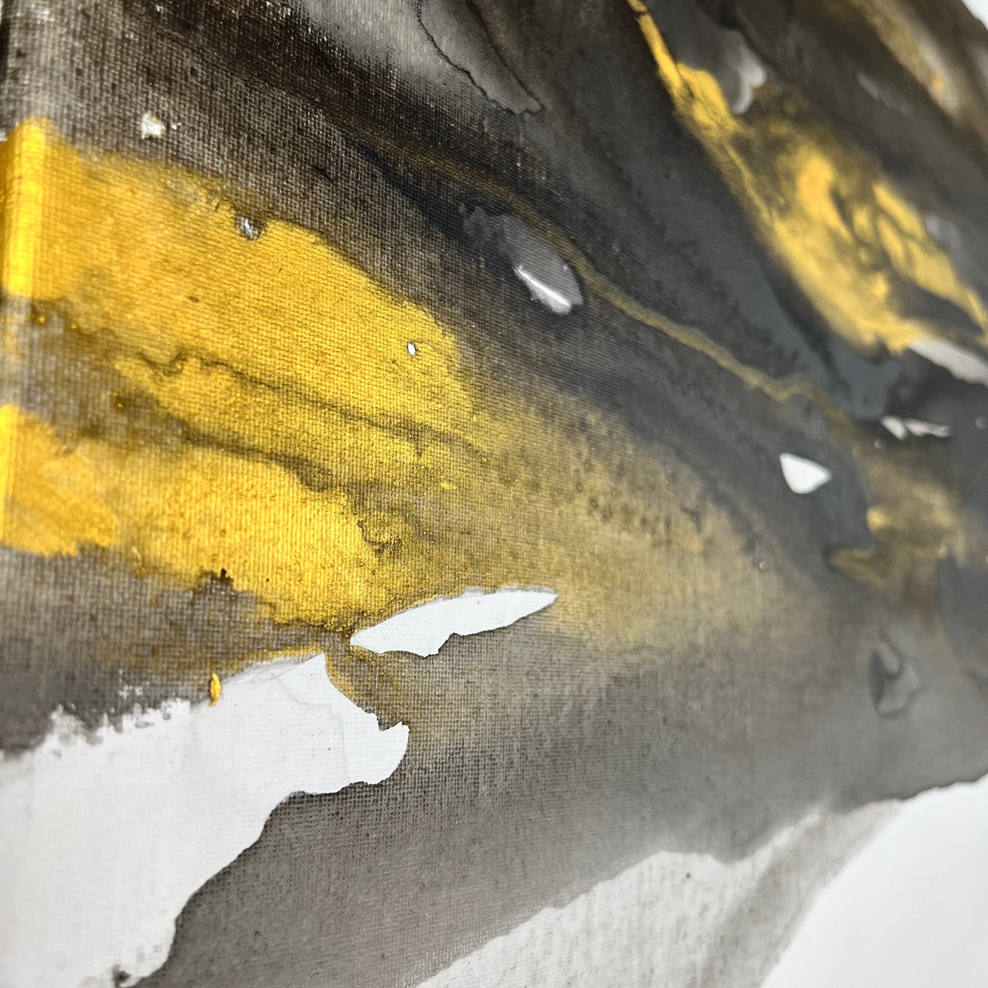 Abstract painting in black, gray, and gold tones by Charlotte George, Earth’s Whisper V, evoking the shifting movement and subtle radiance of the natural world