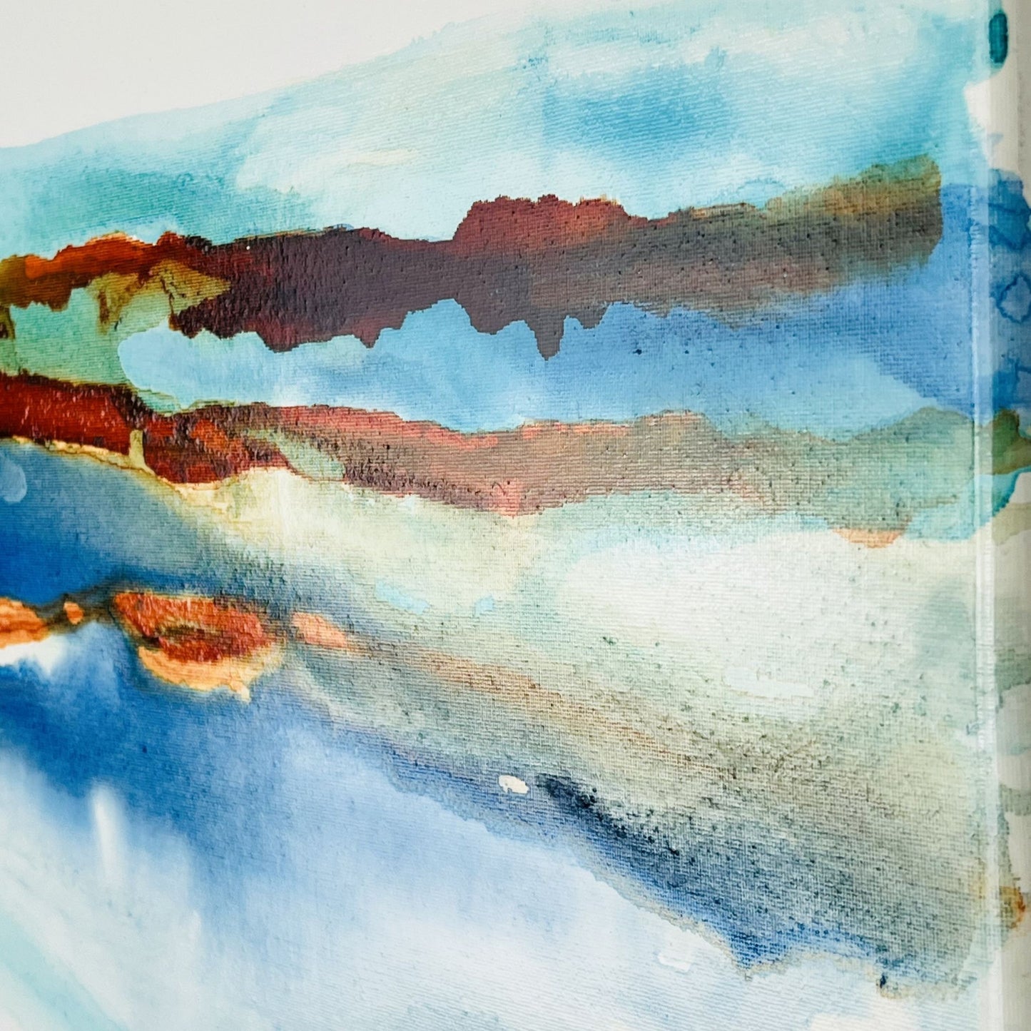 Abstract coastal ink painting with horizontal bands of teal, amber, and ultramarine suggesting a distant shoreline