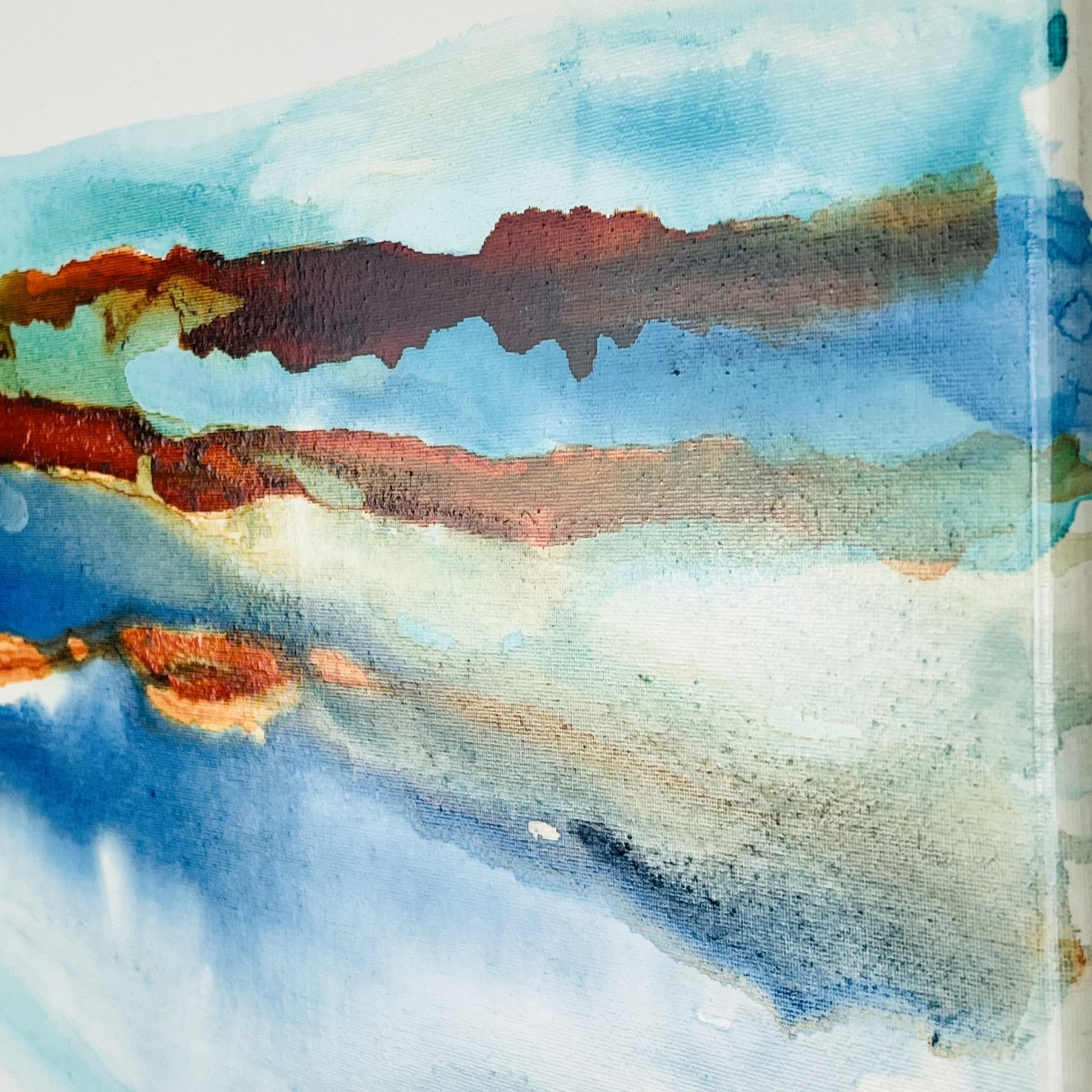Abstract coastal ink painting with horizontal bands of teal, amber, and ultramarine suggesting a distant shoreline