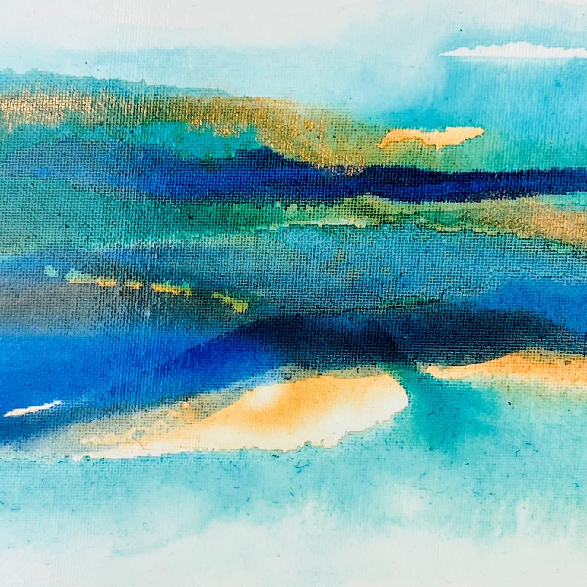 Abstract painting with soft layers of turquoise, brown, and blue ink flowing across a light canvas