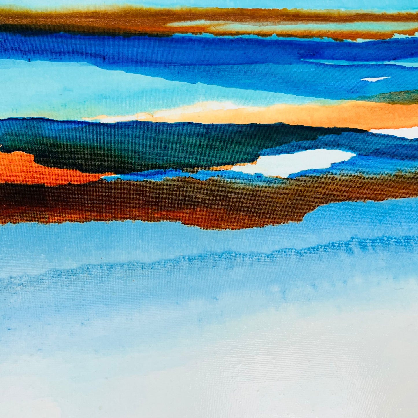 Contemporary abstract painting with layered blue, green, and warm tones forming a coastal-inspired ink landscape