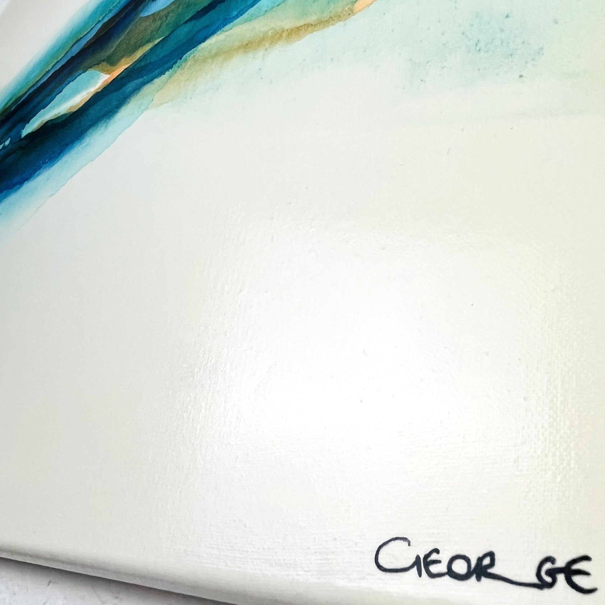 Abstract seascape painting in acrylic ink by Charlotte George, featuring fluid bands of turquoise, deep blue, and golden brown tones, evoking a serene horizon above shallow coastal waters. Titled ‘Shallow Waters VIII