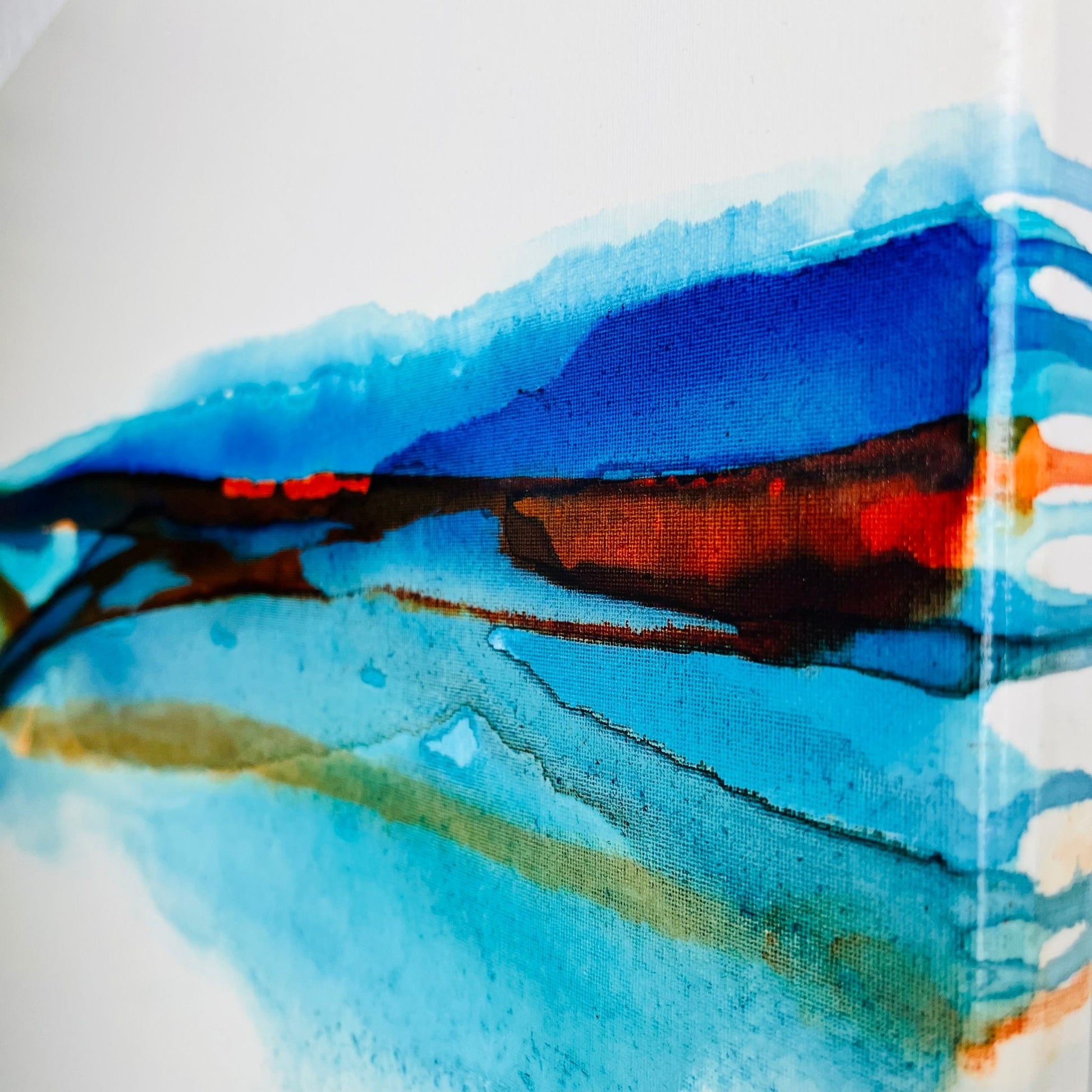 Abstract ink painting with sweeping blue and earth-toned layers evoking a modern coastal seascape