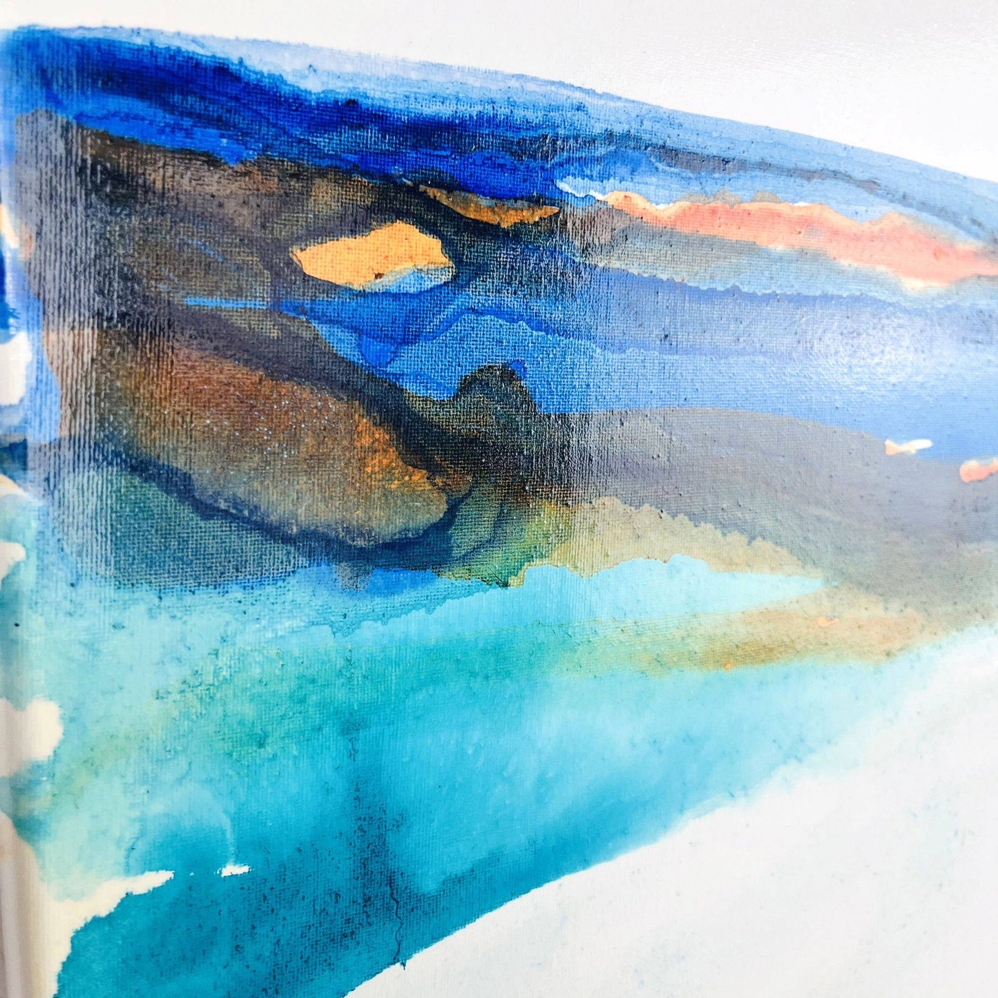 Medium abstract ocean-themed painting with vibrant blue, turquoise, and earthy layers suggesting shoreline and waves